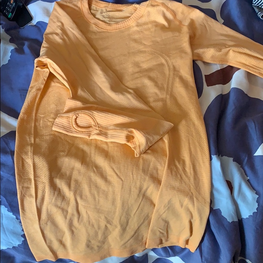 Orange lululemon running shirt